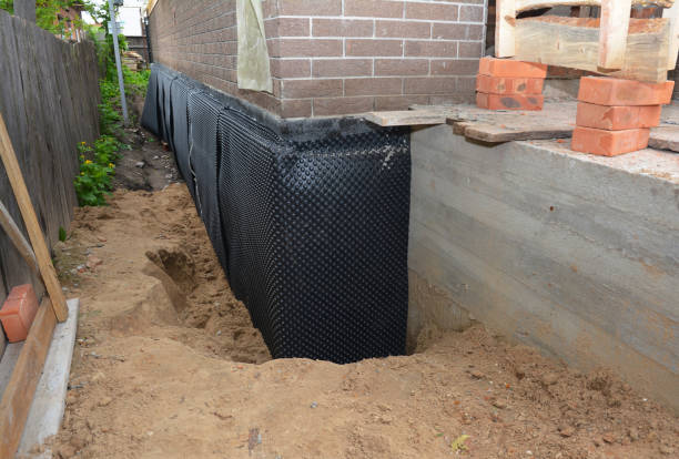 SJ Waterproofing Pros technician performing targeted Emergency Waterproofing assessment in Olivet, NJ